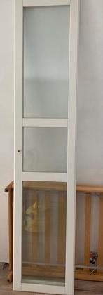 Kastdeur IKEA tussedal, Ophalen