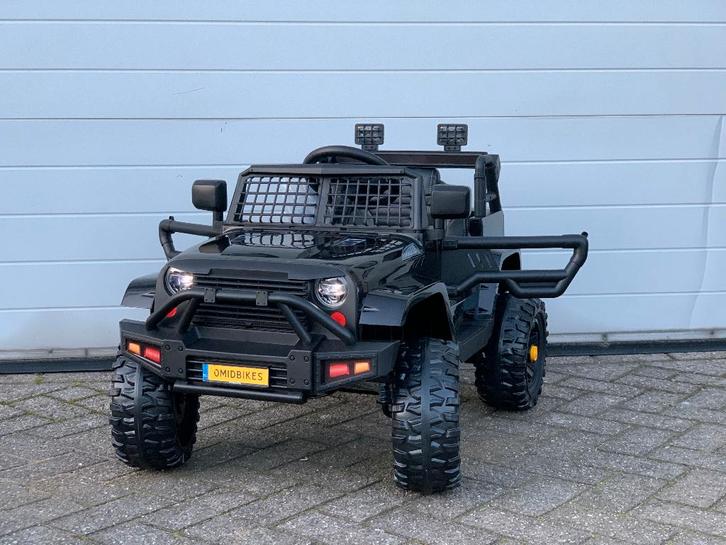 JEEP Mountain King 12v Zwart FM radio, leder, Rubberbanden, Kinderen en Baby's, Speelgoed | Buiten | Accuvoertuigen, Nieuw, Ophalen of Verzenden