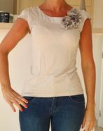 Beige t-shirt bloem, Kleding | Dames, T-shirts, Ophalen of Verzenden, Zo goed als nieuw, Maat 34 (XS) of kleiner, Beige