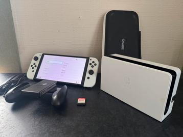 Nintendo switch oled met toebehoren + extra’s beschikbaar voor biedingen