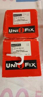 Buisklemmen, betonplug, metalen en kunststof, inslagnagels, Ophalen