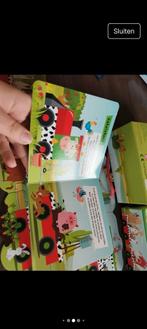 Boerderijdieren boek en puzzeltrein, Ophalen
