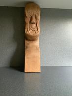 Houten beeld, Ophalen