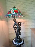 bronzen beeld met lamp, Ophalen