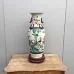 Chinese vaas op voet, Ophalen