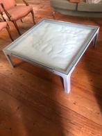 Salontafel met zand, Ophalen