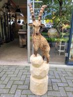 Groot houtsnijwerk van een Steenbok tuinbeeld houtsculptuur, Enlèvement ou Envoi