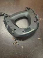 Topkoffer, Motoren, Ophalen