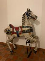 Carroussel-paard, Ophalen
