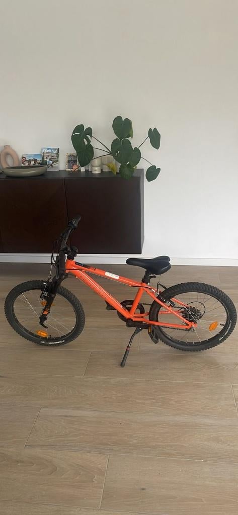 Rockrider 20 inch, oranje, 6 versnellingen, Fietsen en Brommers, Fietsen | Jongens, Ophalen, Versnellingen, Zo goed als nieuw