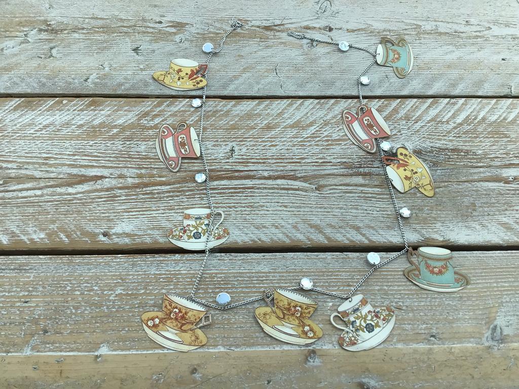 Slinger van theekopjes, Ophalen of Verzenden, Zo goed als nieuw