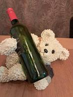 Beren wijnfleshouder, Ophalen