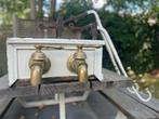 kranen en tegengewicht waterpomp 19e eeuw, Ophalen