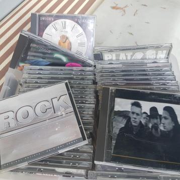 50 cd,s menige toppers zoals u2, dire straits status quo   g beschikbaar voor biedingen