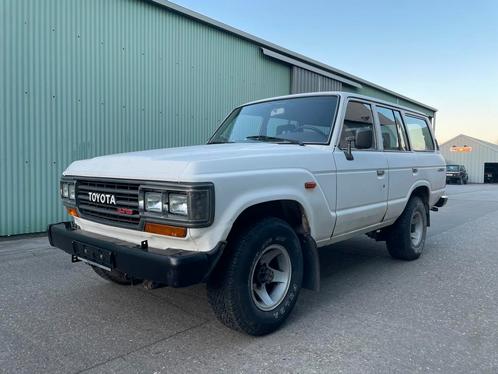 Toyota HJ61 turbo VX, Auto's, Toyota, Particulier, Landcruiser, Elektrische ramen, Diesel, Handgeschakeld, Wit, Grijs, Vierwielaandrijving