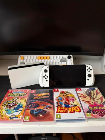 Switch Oled met games en accesoires beschikbaar voor biedingen
