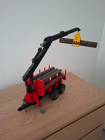 Bruder Forestière + houtaanhanger beschikbaar voor biedingen
