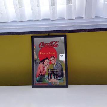 Coca Cola reclame spiegel beschikbaar voor biedingen