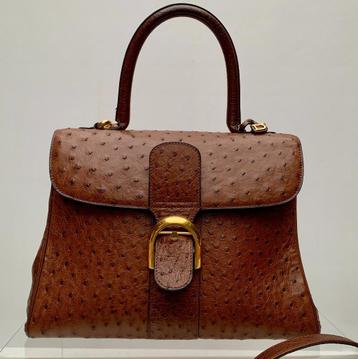 Handtas Delvaux.  Ook Louis Vuitton te koop.