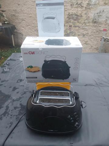 TE KOOP 1 ZWARTE BROODROOSTER IN NIEUWSTAAT VERWARMD = CROIS beschikbaar voor biedingen