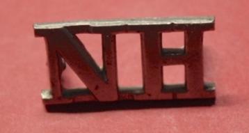 Monogramme "NH" (Northumberland Hussars)". Original WWII.