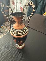 Griekse handgeschilderde vaas, Ophalen