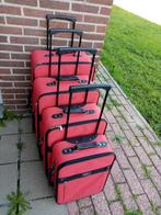 Reiskofferset, Ophalen, Gebruikt, Uitschuifbare handgreep