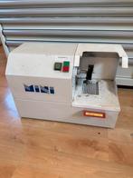 Horlogemaker polijstmachine, Ophalen