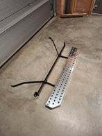 Achteropstap / achtertrede, Enlèvement