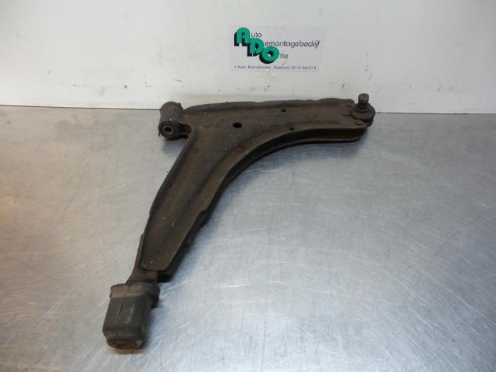 Draagarm rechts-voor van een Volkswagen Caddy (Caddy 82-), Auto-onderdelen, Ophanging en Onderstel, Volkswagen, Gebruikt, 3 maanden garantie