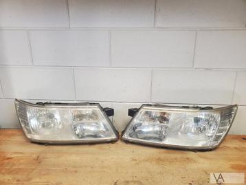Dodge Journey / Fiat Freemont koplamp links en rechts €100st beschikbaar voor biedingen