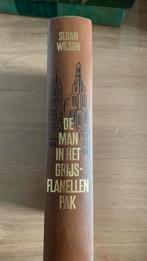 Boek “ de man in het grijsflanellen” door Sloan Wilson, Zo goed als nieuw