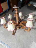 5 houten lusters, Ophalen
