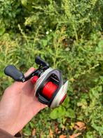 Abu Garcia Revo Stx Reel Casting Reel met laag profiel, Watersport en Boten, Hengelsport | Roofvissen, Ophalen of Verzenden, Zo goed als nieuw