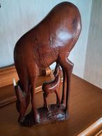 houten beeld, Ophalen