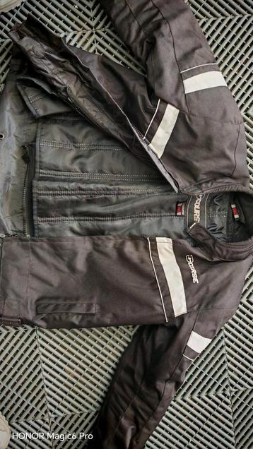 Motovest voor kind.. 140 zo goed als nieuw beschikbaar voor biedingen