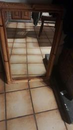 Miroir en rotin et bambou, Enlèvement