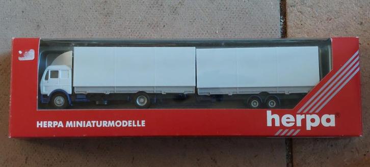 H0LK 1003 MERCEDES-BENZ VRACHTWAGENS 1:87., Hobby en Vrije tijd, Modelauto's | 1:87, Zo goed als nieuw, Bus of Vrachtwagen, Herpa