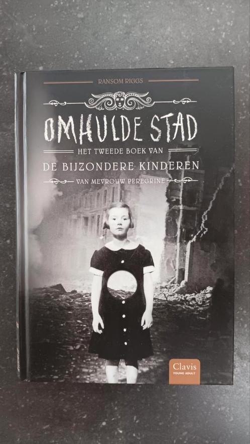 Ransom Riggs - Omhulde stad, Livres, Livres pour enfants | Jeunesse | 13 ans et plus, Comme neuf, Enlèvement ou Envoi