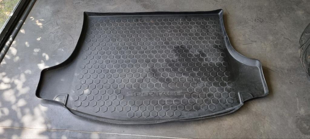 Kofferbakmat Kia Sportage III, Ophalen