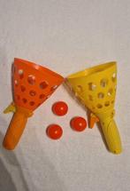 Katapult met plastic ballen, Ophalen