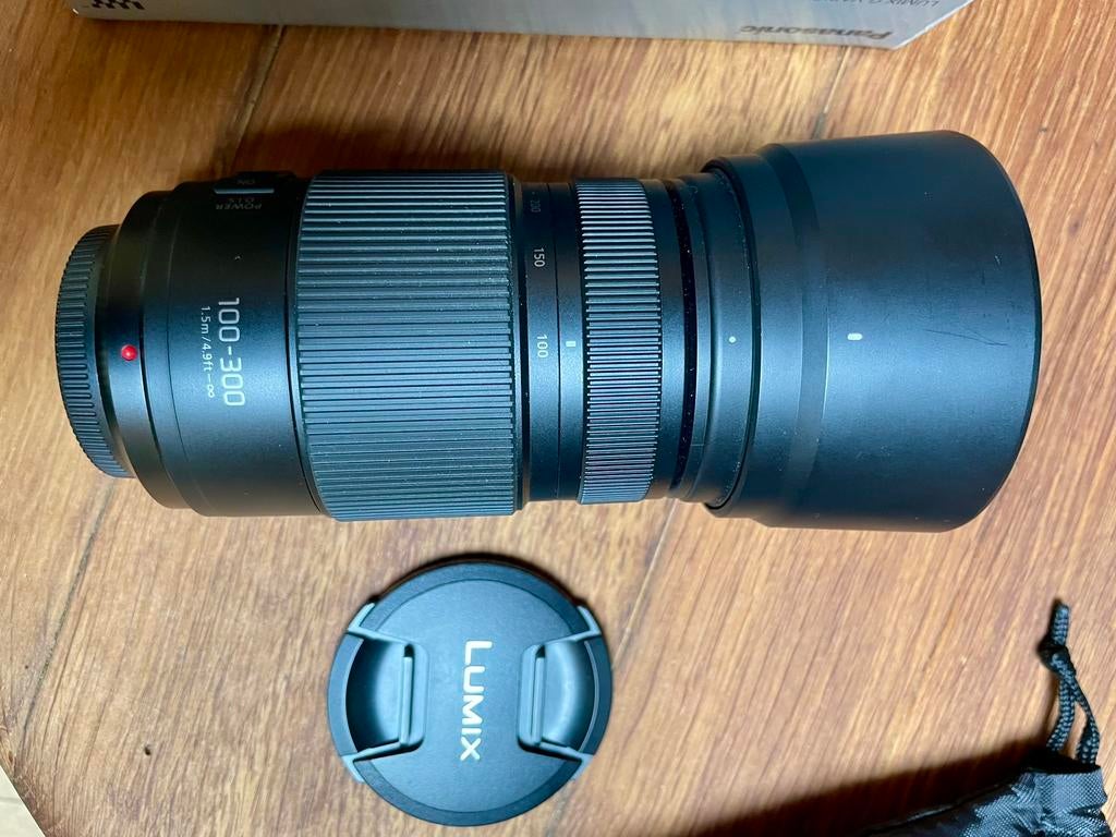 Panasonic Lumix Gvario 100 - 300 mm F 4,0-5,6 II + filtres, Enlèvement, Comme neuf