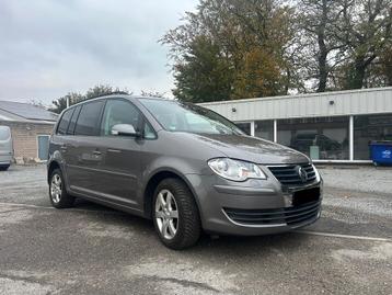 Vw Touran 1.4TSI 7 places 1er propriétaire et garantie 1 an  disponible aux enchères