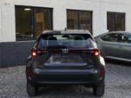 Toyota Yaris Cross Hybrid 1.5i VVT-i Dynamic E-CVT - NAVI, Stof, https://public.car-pass.be/vhr/2c041b9f-d299-41aa-a72f-b5cd4d302ea7