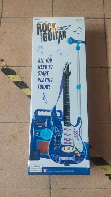 Nieuwe speelgoed gitaar 