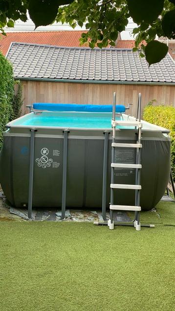Zwembad Intex 274 x 549 x 132 cm en warmtepomp, Enlèvement, Comme neuf