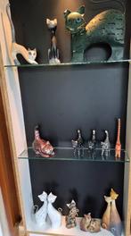 Collectie kattenbeeldjes in allerlei materiaal, Ophalen