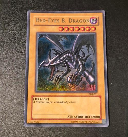 Yu-Gi-Oh red-eyes B. dragon, Hobby en Vrije tijd, Verzamelkaartspellen | Yu-gi-Oh!, Zo goed als nieuw, Losse kaart, Foil, Ophalen of Verzenden