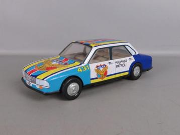 Vintage speelgoedpolitieauto beschikbaar voor biedingen