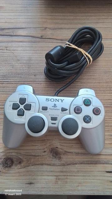 Originele Playstation 2 controller.  Zilver  beschikbaar voor biedingen